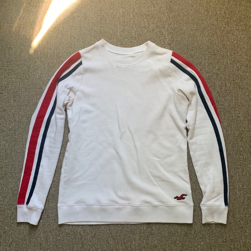 Hollister crew neck white sweater with stripes in a size XS